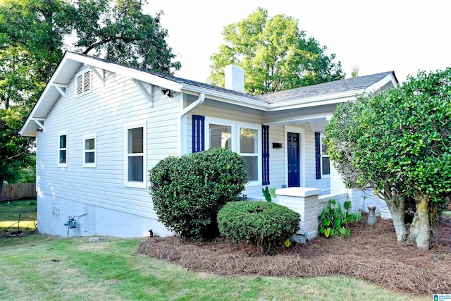 view of front of home with a front yard