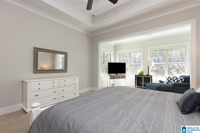 bedroom featuring crown molding, carpet flooring, and ceiling fan