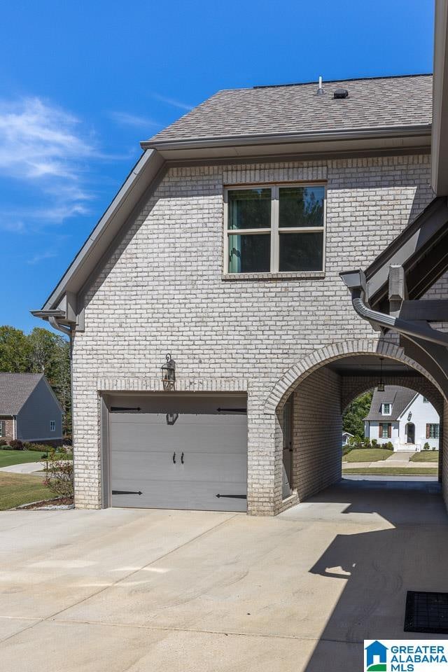 view of property exterior with a garage