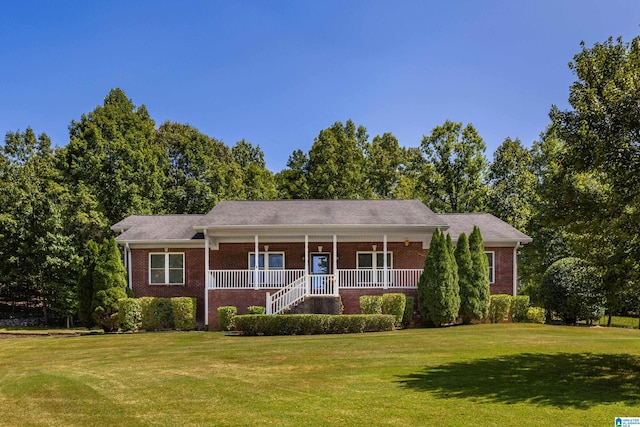 ranch-style house with a front lawn and a porch