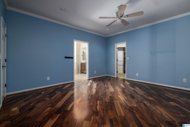 empty room with crown molding, ceiling fan, and dark hardwood / wood-style floors