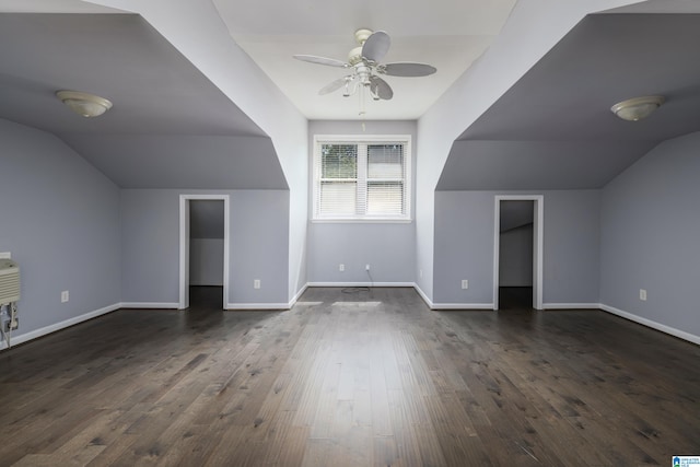 additional living space featuring lofted ceiling, ceiling fan, and dark hardwood / wood-style flooring