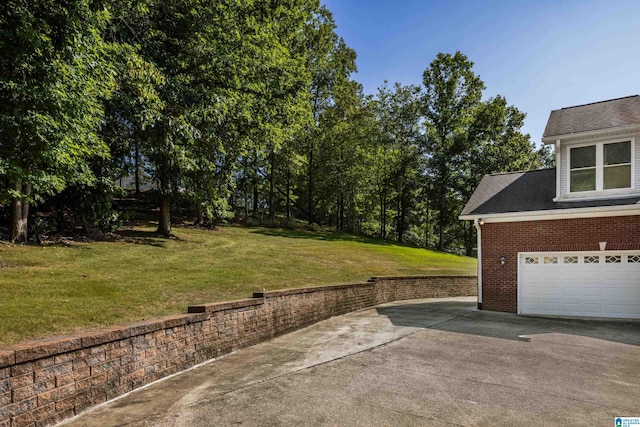 view of yard with a garage