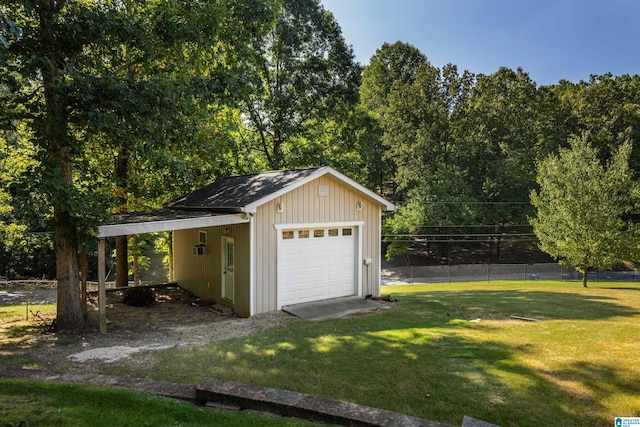 garage with a yard