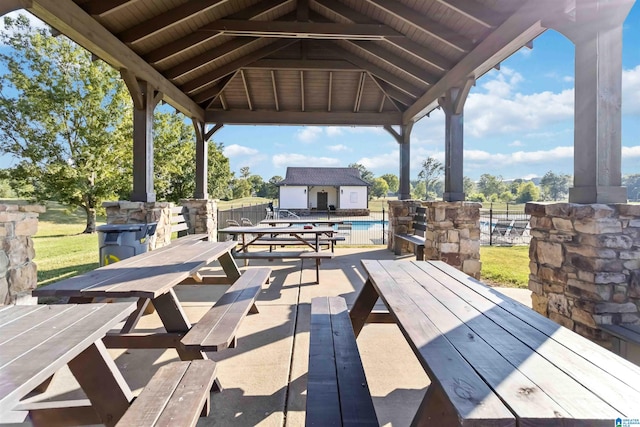 wooden terrace with a gazebo