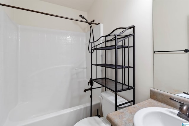 full bathroom featuring shower / tub combination, toilet, and vanity