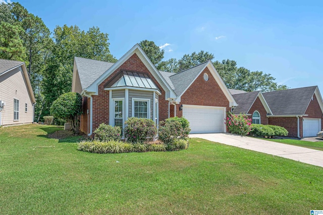 view of front of home with a garage and a front lawn