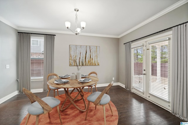 dining room featuring crown molding, baseboards, and dark wood-style flooring