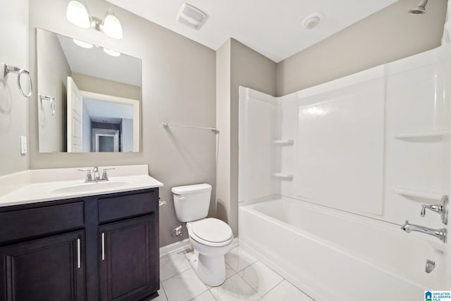 full bathroom with visible vents, toilet, baseboards, bathing tub / shower combination, and vanity