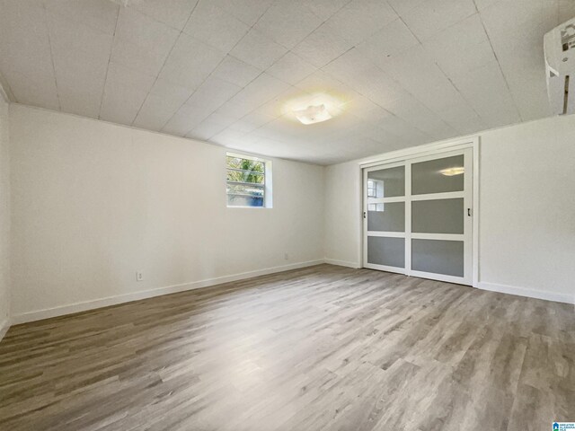 spare room featuring light wood-type flooring