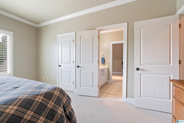 bedroom with light carpet, a closet, baseboards, and ornamental molding