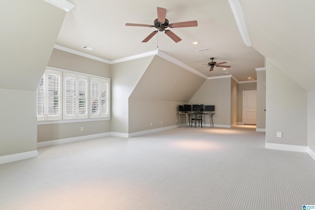 additional living space with visible vents, baseboards, carpet, and lofted ceiling