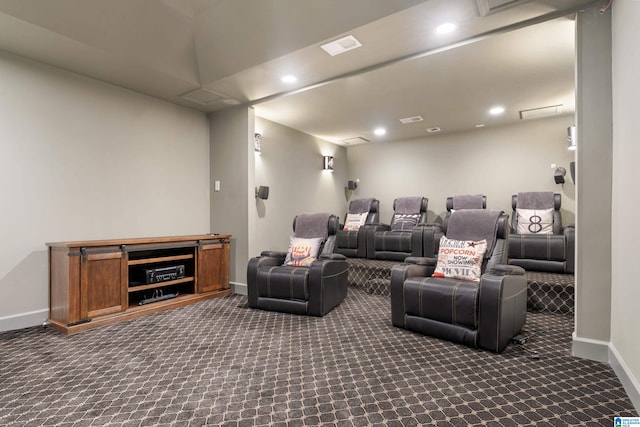 carpeted cinema with visible vents, recessed lighting, and baseboards