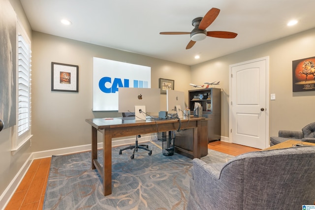 office area featuring a ceiling fan, recessed lighting, wood finished floors, and baseboards