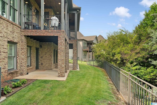 view of yard featuring a patio area and fence