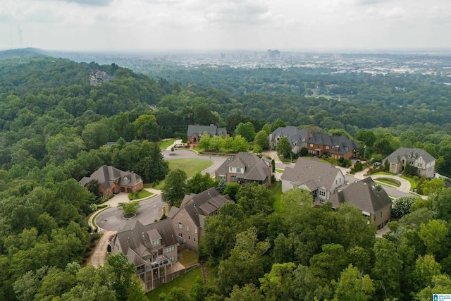 aerial view featuring a residential view and a view of trees