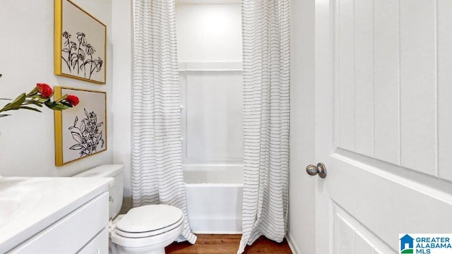 full bathroom with shower / bathtub combination with curtain, vanity, toilet, and wood finished floors