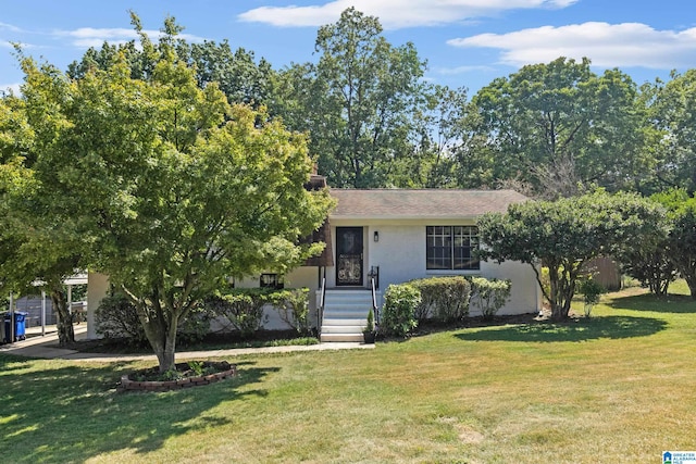 view of front of home with a front yard