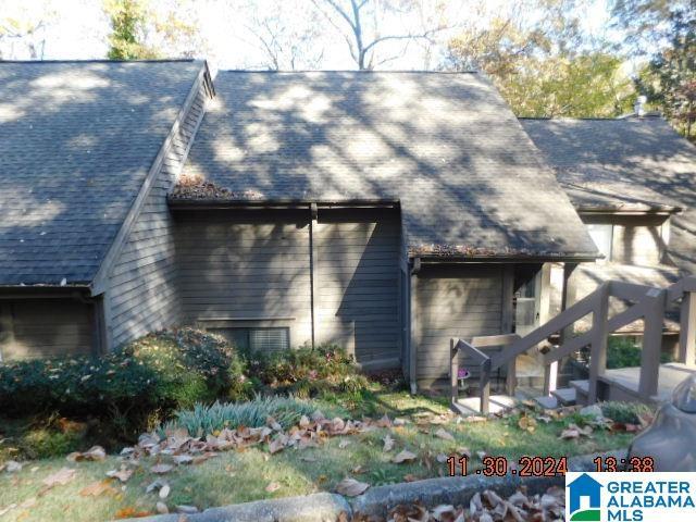325 Heath Dr Unit 0, Birmingham, AL 35242 - view of side of property with a shingled roof