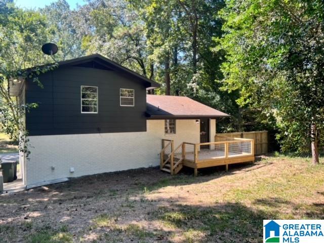 rear view of house with a deck