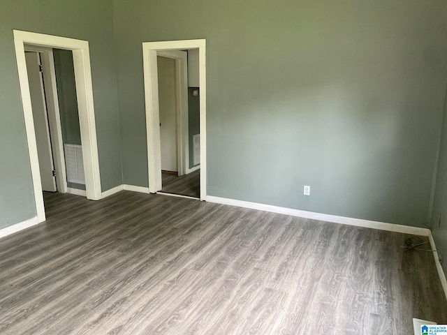 unfurnished room featuring hardwood / wood-style floors