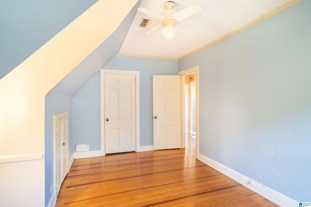 bonus room featuring lofted ceiling, ceiling fan, and light hardwood / wood-style floors