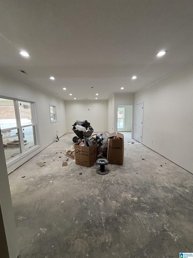 interior space with crown molding