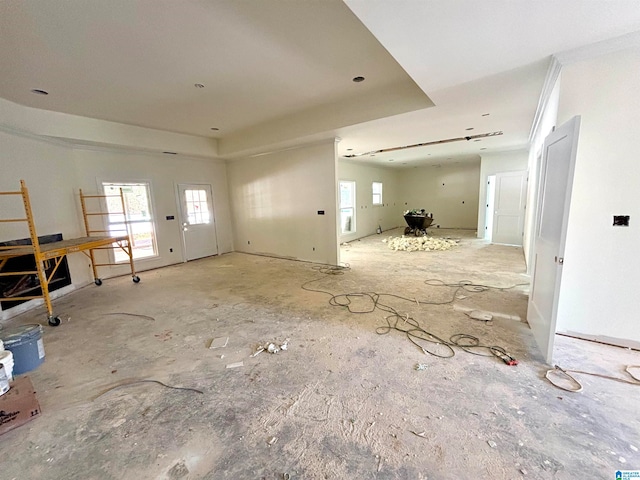 unfurnished living room with a wealth of natural light