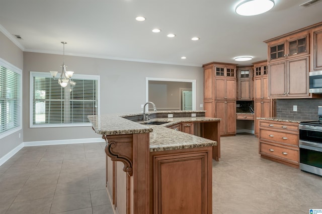 kitchen with stainless steel appliances, brown cabinetry, a sink, and crown molding