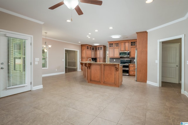 kitchen with tasteful backsplash, baseboards, brown cabinetry, stainless steel appliances, and crown molding