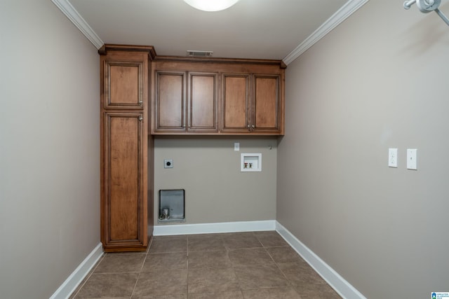 washroom featuring crown molding, hookup for a washing machine, visible vents, electric dryer hookup, and baseboards