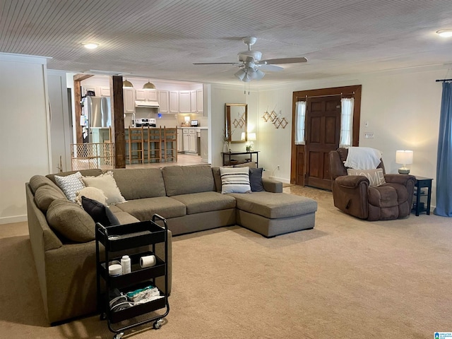 living room featuring ceiling fan and light carpet