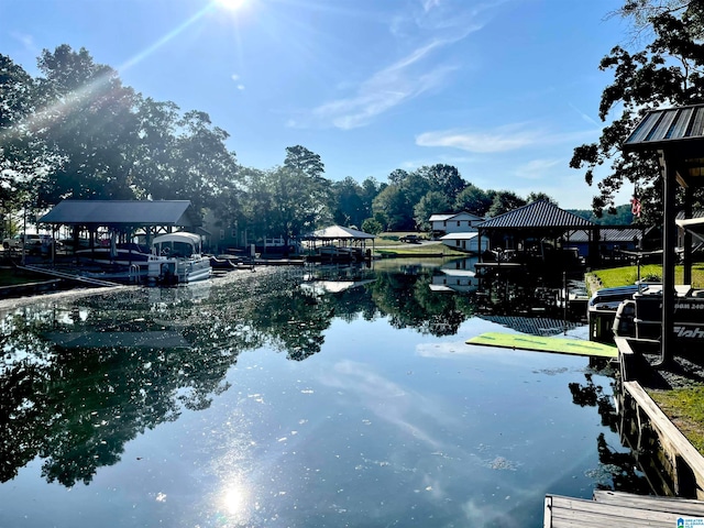 view of water feature featuring a boat dock and a gazebo