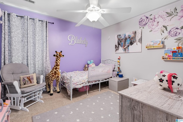 bedroom featuring ceiling fan and carpet floors