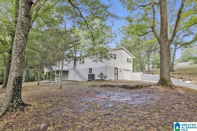 2604 Wood Dr NE, Center Point, AL 35215 - view of property exterior featuring cooling unit and stairway