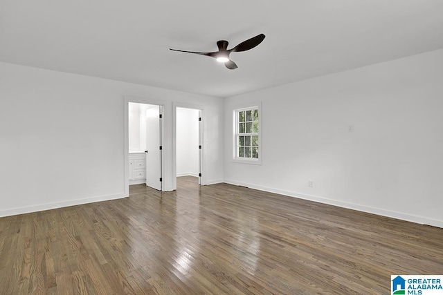 2604 Wood Dr NE, Center Point, AL 35215 - unfurnished bedroom with connected bathroom, baseboards, ceiling fan, and wood finished floors