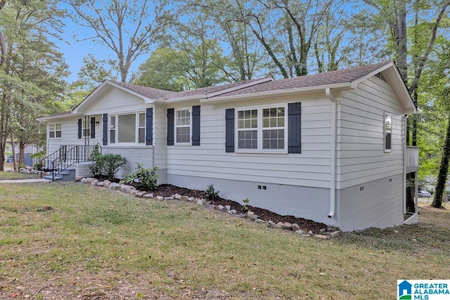 single story home with a front yard