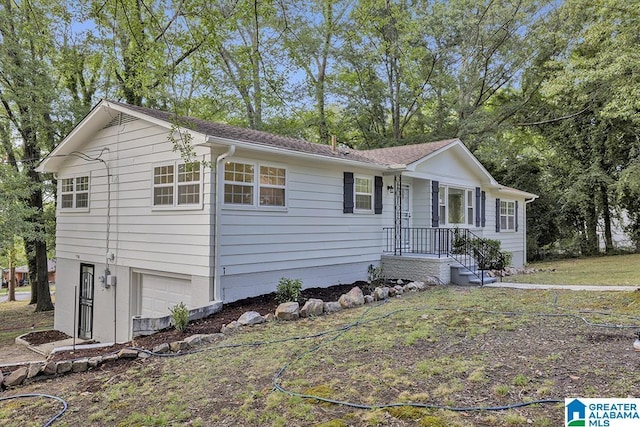 2604 Wood Dr NE, Center Point, AL 35215 - ranch-style house with an attached garage