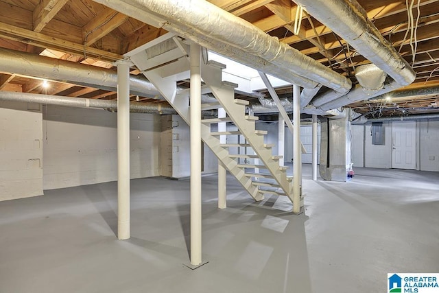 2604 Wood Dr NE, Center Point, AL 35215 - unfinished basement with electric panel and stairs