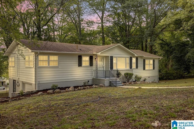 2604 Wood Dr NE, Center Point, AL 35215 - ranch-style home with a garage and a yard