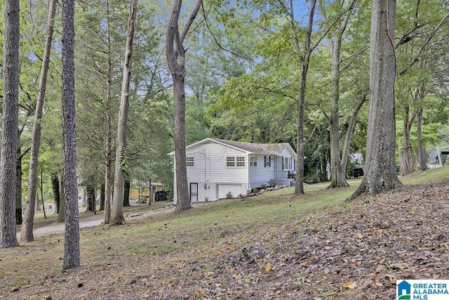2604 Wood Dr NE, Center Point, AL 35215 - view of front facade featuring a garage