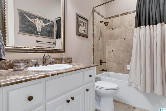 full bathroom with tile patterned flooring, vanity, toilet, and shower / tub combo