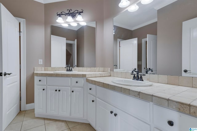 bathroom featuring tile patterned flooring, vanity, and ornamental molding