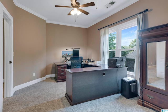 carpeted office featuring ceiling fan and crown molding