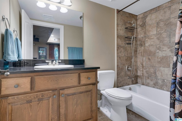 full bathroom with tile patterned flooring, toilet, shower / tub combo with curtain, and vanity