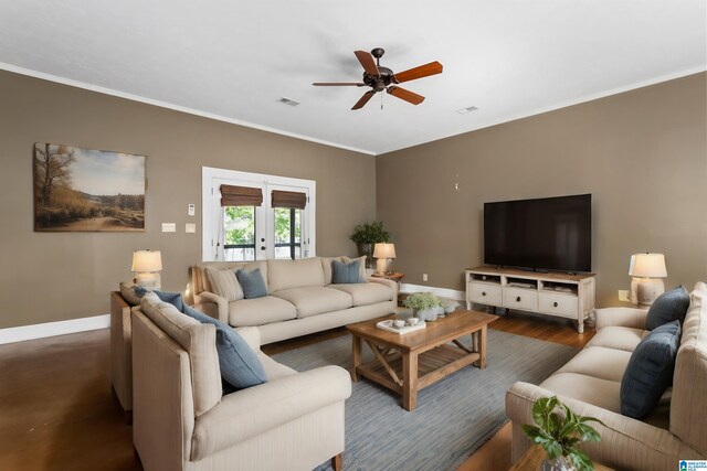 living room featuring crown molding, french doors, ceiling fan, and dark hardwood / wood-style floors