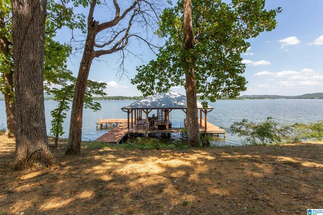 view of dock with a water view