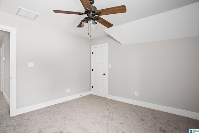 empty room with carpet flooring and ceiling fan