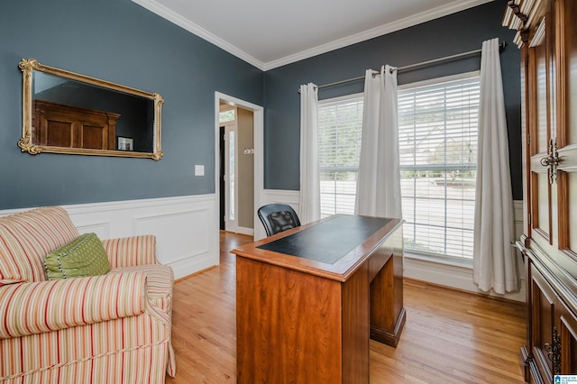 home office featuring light wood-type flooring and crown molding