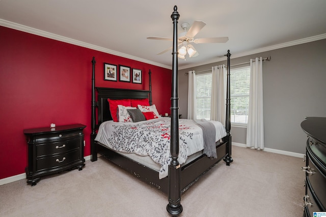 bedroom featuring ceiling fan, light carpet, and crown molding